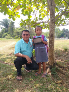 Pastor Juan and student
